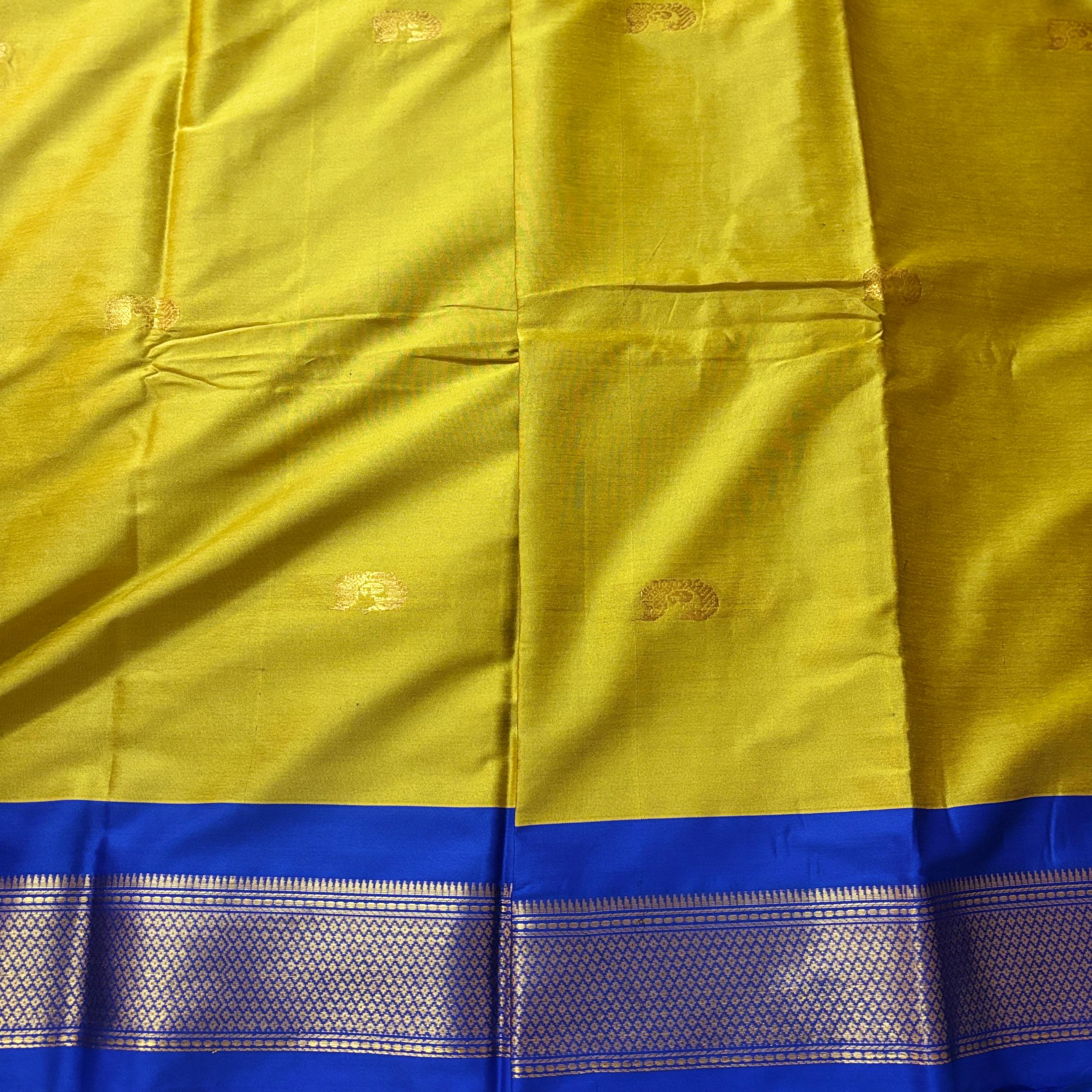 Shakti Vilas Mustard Yellow Royal Blue Border Gadwal Silk Saree